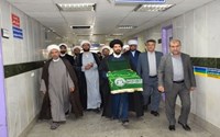 پرچم متبرک به مرقد مطهر حضرت امام علی(ع) بر بالین پرسنل و بیماران بیمارستان عباسی میاندوآب
